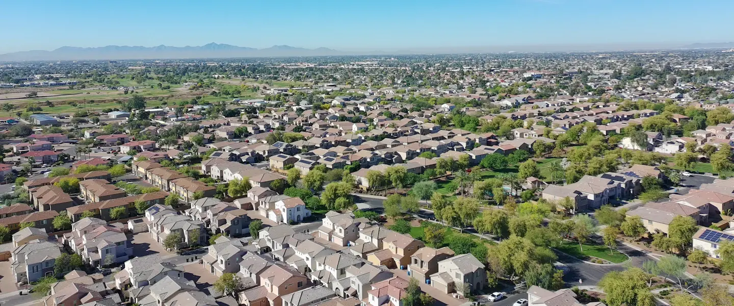 A sprawling Arizona suburb under a clear blue sky